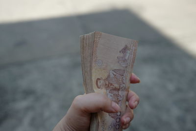 Close-up of hand holding water