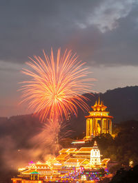 Firework display at night