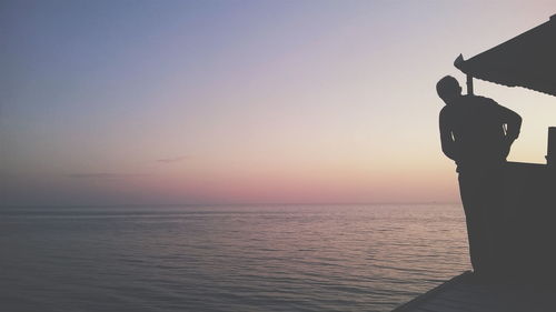 Scenic view of sea at sunset