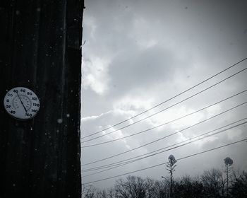 Low angle view of birds against sky