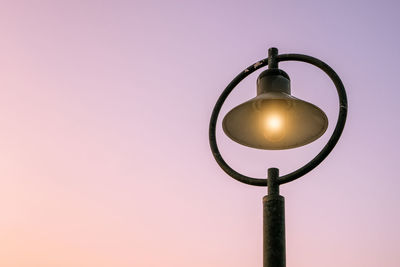 Street lamps and morning light