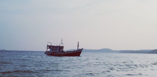 Boat sailing in sea