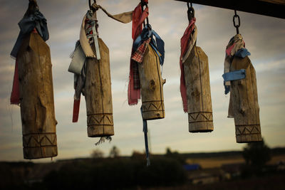 Low angle view of umbrellas hanging in temple