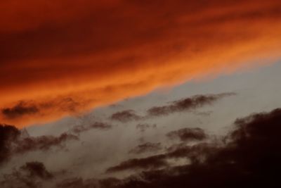 Low angle view of clouds in sky during sunset