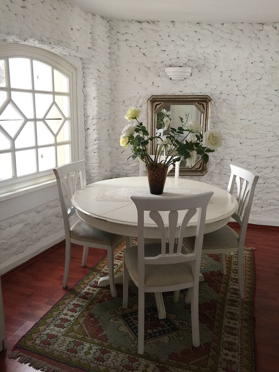 POTTED PLANT ON TABLE AT HOME