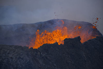 View of bonfire on mountain