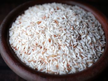 High angle view of rice in container