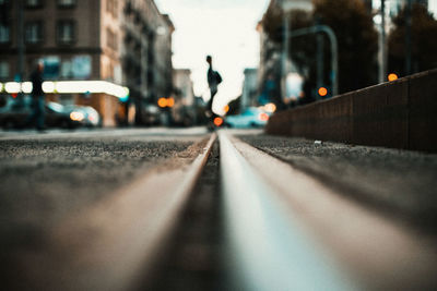 Surface level of railroad tracks on street in city