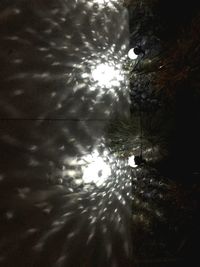 Close-up of glass window against sky