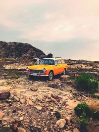 Yellow car on land