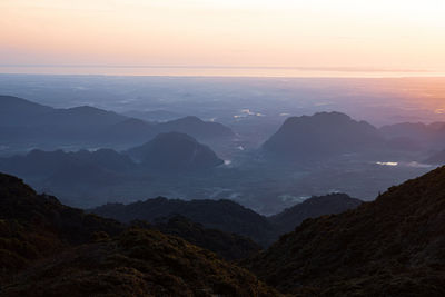 Scenic view of mountains against sky during sunset