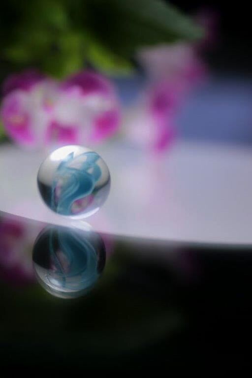 close-up, focus on foreground, indoors, selective focus, table, glass - material, fragility, still life, transparent, flower, reflection, water, no people, freshness, drop, pink color, glass, purity, single object, shiny