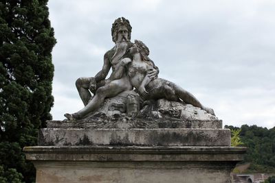 Low angle view of statue against sky