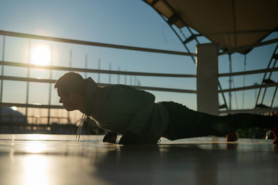 Low angle view of man standing in gym