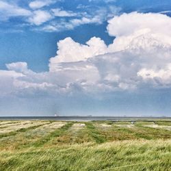 Scenic view of land against sky