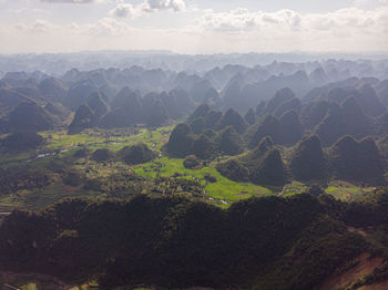 Scenic view of mountains against sky in asia