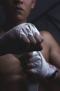 Close-up of man holding hands