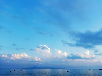 Scenic view of sea against cloudy sky