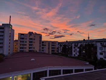 High angle view of buildings against sky at sunset