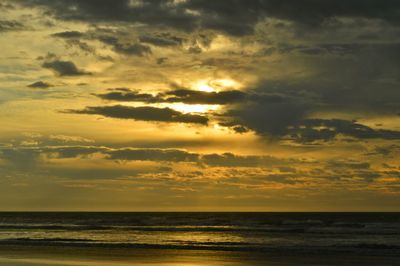 Scenic view of sea at sunset