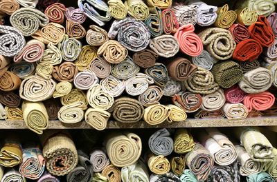 Fabric rolls displayed at a fair