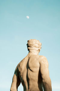 Low angle view of statue against clear sky