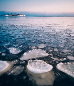 Scenic view of sea against sky during winter