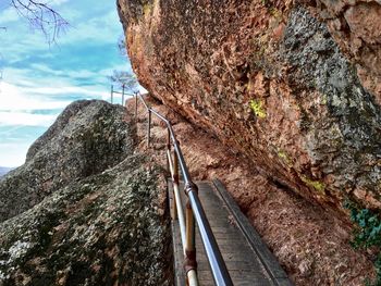 High angle view of railroad tracks amidst trees against sky