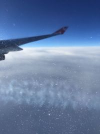 Scenic view of airplane flying in sky at night