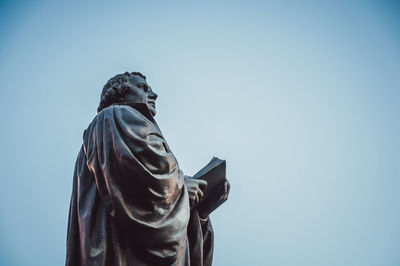 Low angle view of statue against clear sky