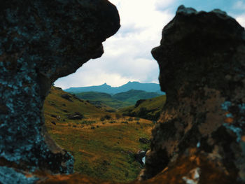 View through stone formation on drakensberg mountains