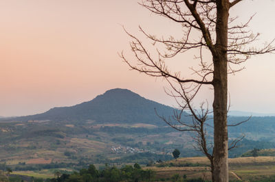 Scenic view of landscape against sky during sunset