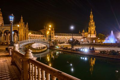 Illuminated city lit up at night