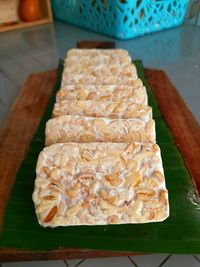 High angle view of bread on cutting board