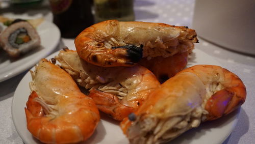 High angle view of fish in plate on table