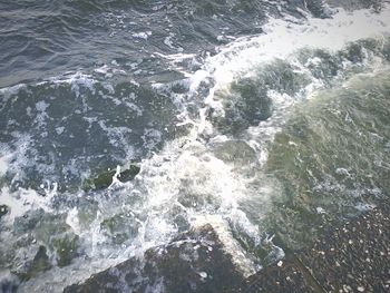 Waves splashing on rocks