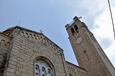 Low angle view of old building against sky