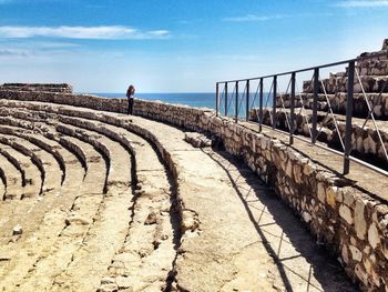 Ancient amphitheater overlooking calm sea