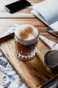 High angle view of coffee cup on table