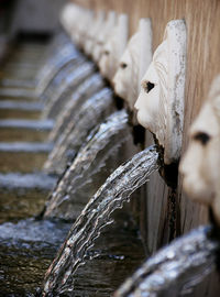 Close-up of sculpture on wooden post