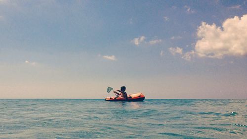 Boat sailing in sea