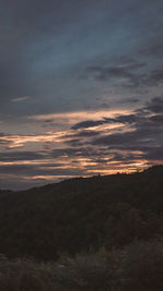 Scenic view of dramatic sky during sunset