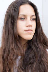 Portrait of young woman with cerulean eyes