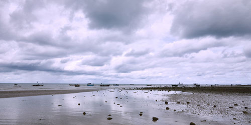 Scenic view of beach against sky