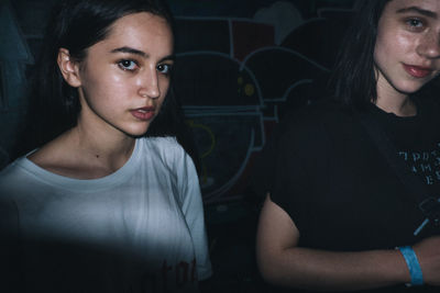 Portrait of young women at night