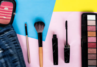 High angle view of various paint on table