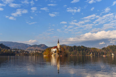 View of a lake with temple in the background