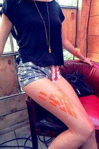 Midsection of woman sitting on floor