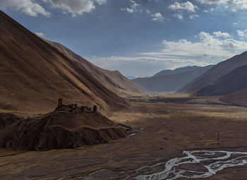 Scenic view of desert against sky