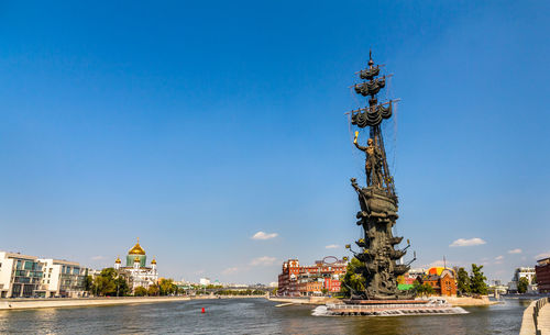 City at waterfront against sky